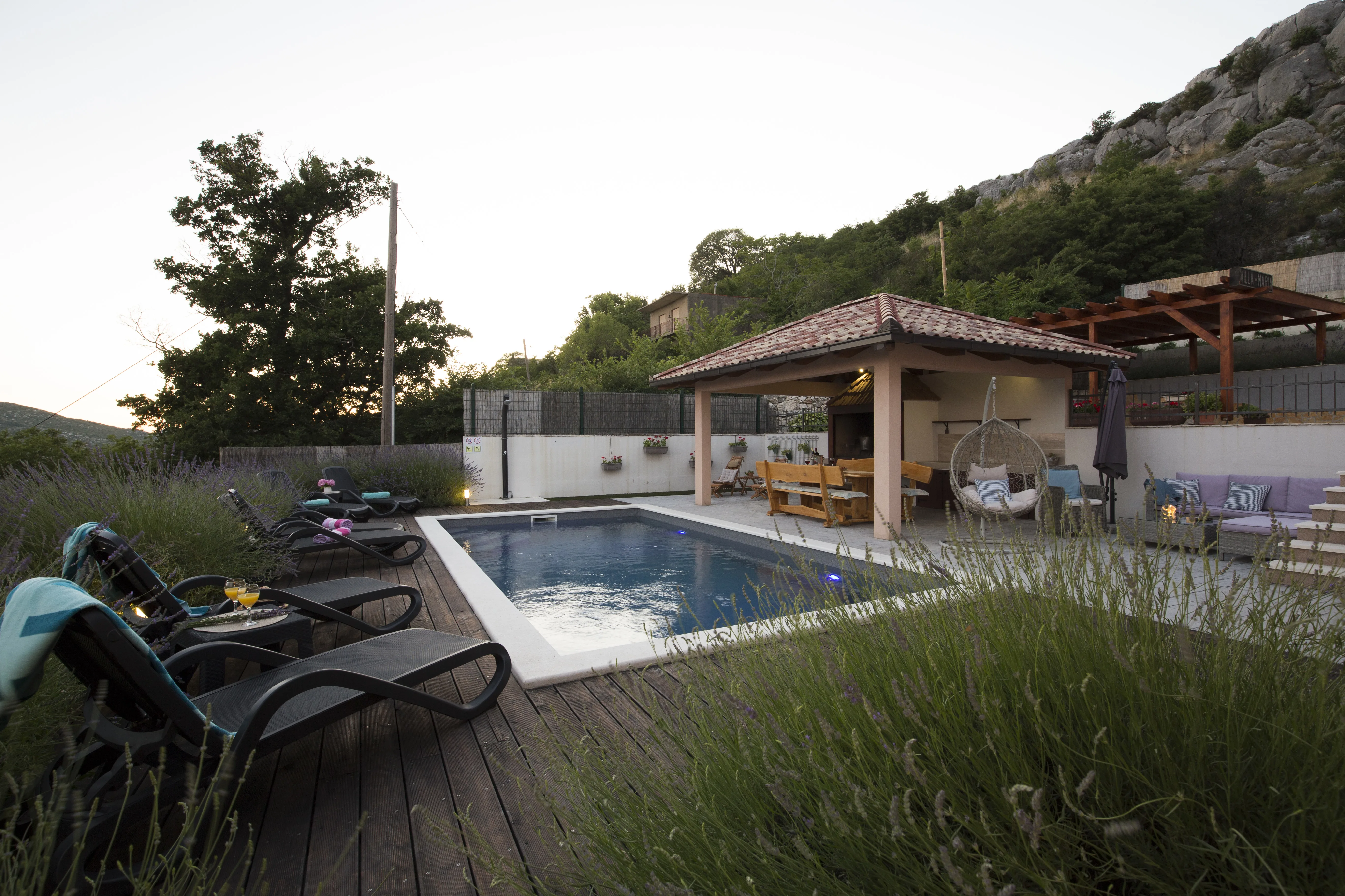 Pool and lavender garden at dusk